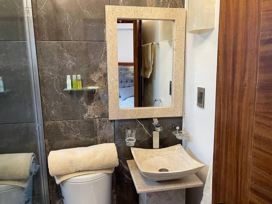 Suites C O V A D O N G A Mexico-stad Kamer foto
